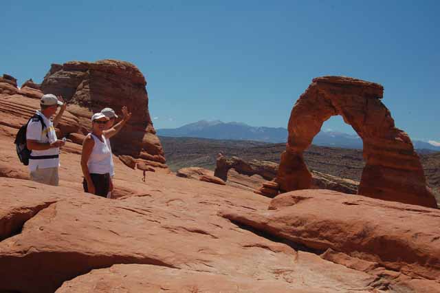 waving good-bye to Delicate Arch